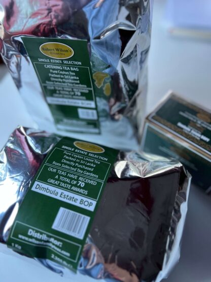 Dimbula tea packs. Showing 400 teabags, 1kg foil, and 25 teabag carton.